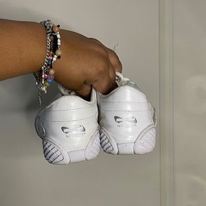 white Nfinity evolution cheer shoe size 9